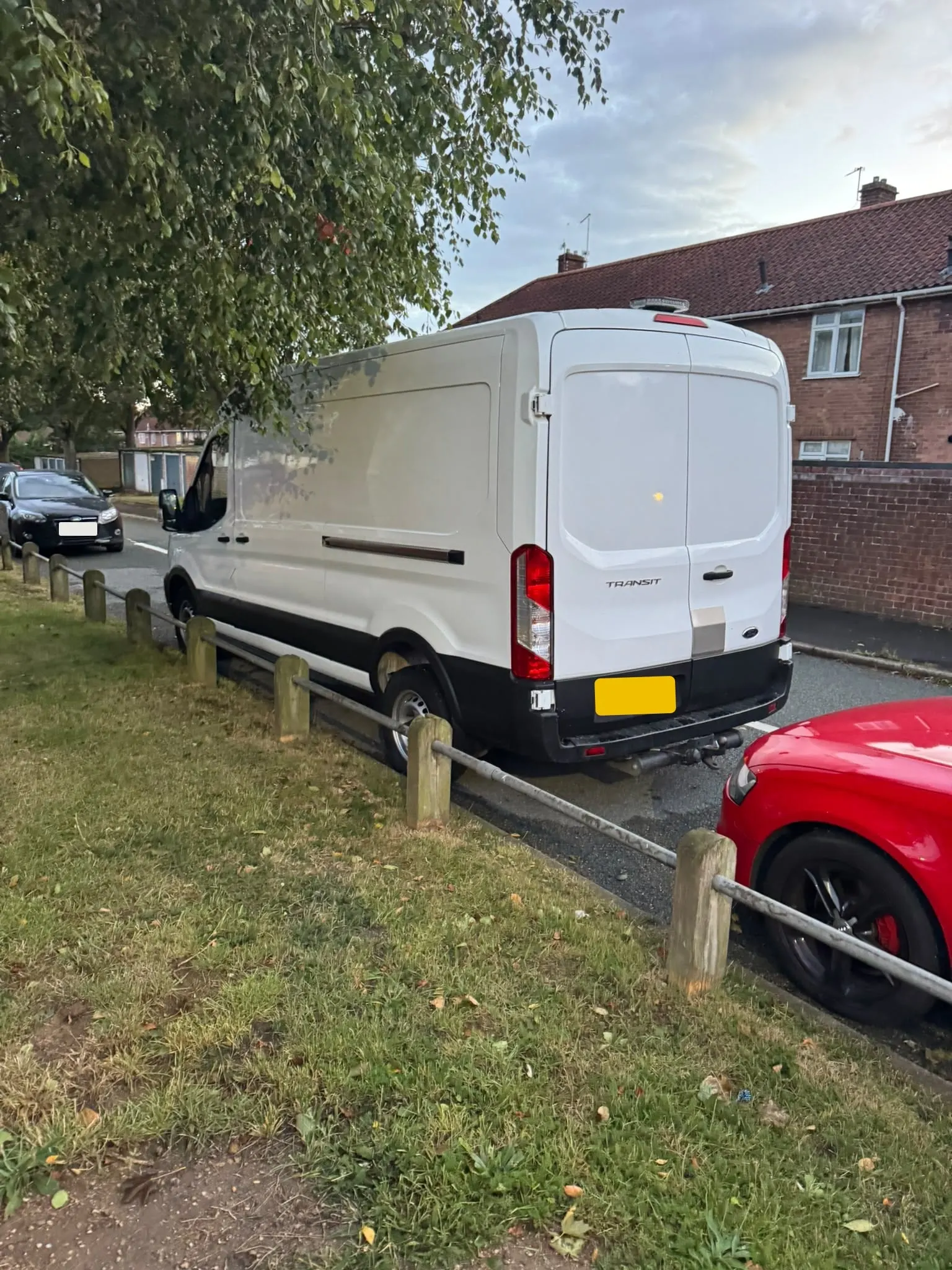 Rear doors of Matedy's Ford Transit van on a Norwich street